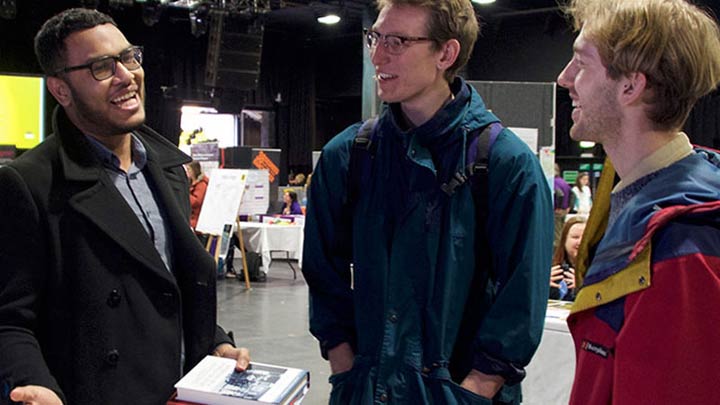 Students chatting at an event